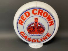 A reproduction Red Crown Gasoline plastic petrol pump globe.
