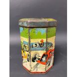 An octagonal motoring game tin, with a design depicting racing cars to the side.