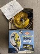 A boxed Miller fog lamp, appears new old stock.