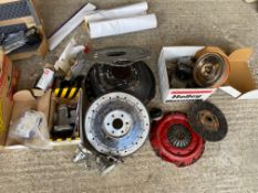 A selection of Shelby Cobra parts, comprising clutch and housing, plate, Holley carburettor and