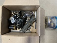 A box of assorted pre-war car parts including wiper motors, quick release fuel filler cap,