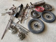 Two gearboxes, possibly Morris, various wheels including Morris and Austin, two Morris bumpers and a
