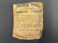 A Palmer Tyres promotional rubber ring in original packaging.
