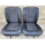 A pair of vinyl front seats, in very good condition, believed to be Ford Escort GT/Mexico/Lotus