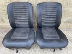 A pair of vinyl front seats, in very good condition, believed to be Ford Escort GT/Mexico/Lotus