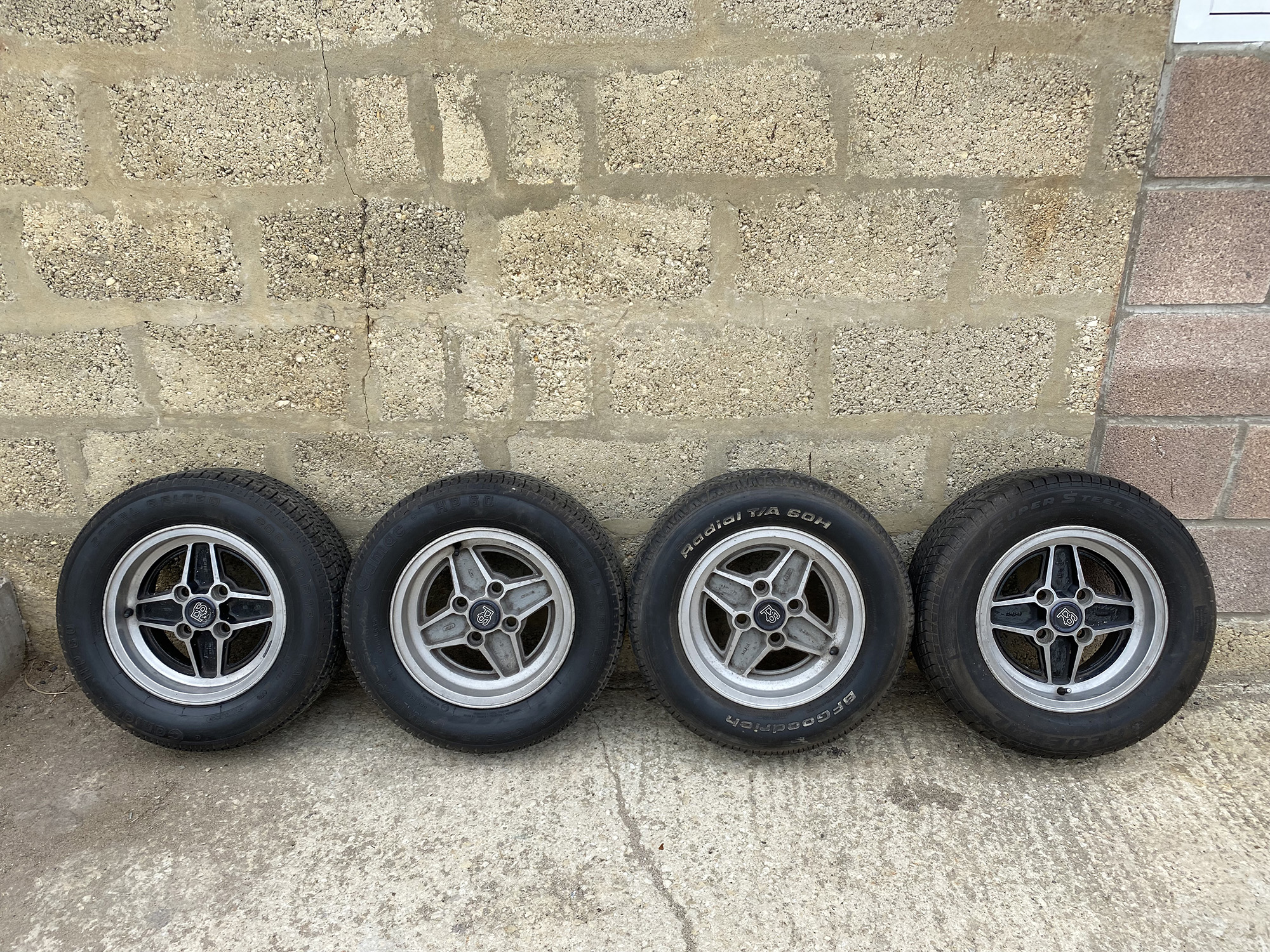 A genuine set of four RS 2000 four spoke wheels, manufactured 1979, 13 x 6J, centre