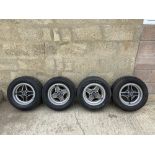 A genuine set of four RS 2000 four spoke wheels, manufactured 1979, 13 x 6J, centre