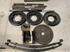 A quantity of Alvis 12/50 parts comprising three brake drums with shoes, two leaf springs, half