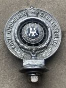 An RAC Associate car badge with The Auckland Automobile Association enamel centre, no. 1312.