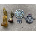 A Mullard Motor Cycle & Car Club badge, Blackburn, no. M2280, an amber coloured glass mascot of a