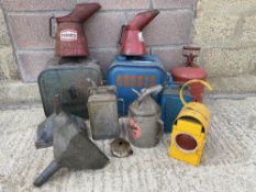 A selection of assorted fuel cans, oil measures, an Eltex funnel etc.