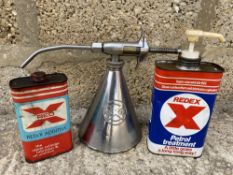 A Redex polished metal conical dispensing gun and two additive cans.