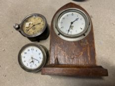 Two pre-war Smiths car clocks plus an Edwardian car clock with sloping back.