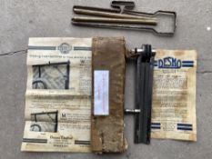 An early Desmo hand operated windscreen wiper, with original instructions and conditions of sale