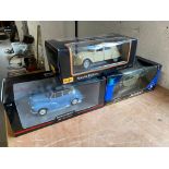Three large scale models, including Maisto and Minichamps, two Citroen 2CVs and one Morris Minor.