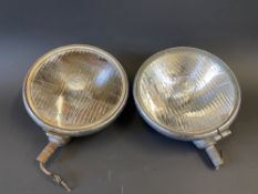 A pair of Lucas SFT 700S lamps.