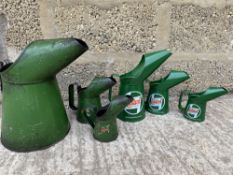 Six Castrol oil measures including a graduated set of three reproduction examples.