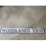 A street name sign for Woodlands View, 49 x 6".