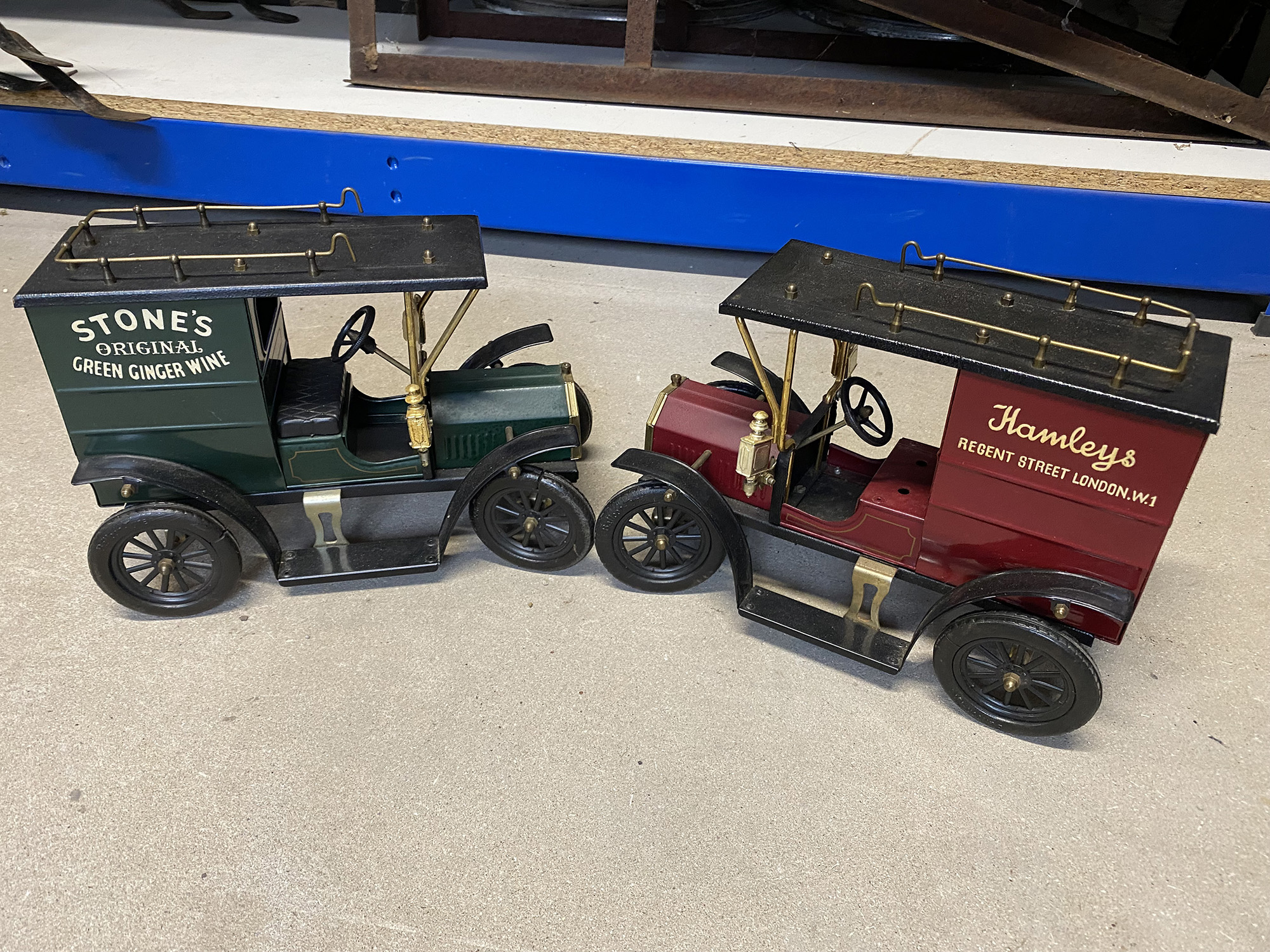 Two contemporary models of Ford Model T vans.