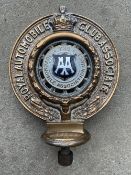 An RAC Associate car badge with The Automobile Association (Inc.) enamel centre.