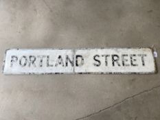 A street name sign for Portland Street, 51 x 9".