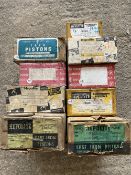 A collection of boxed sets of pistons including 6-cylinder Bedford, n.o.s., BMW, Mini Mk. II Elf,