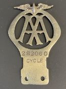 An AA Cycle badge, no. 282060.