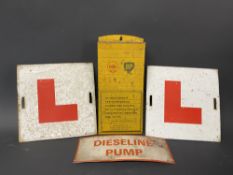 A pair of tin L plates, a Shell BP wall hanging tin rack and a small Dieseline Pump sign.