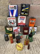 A selection of assorted oil cans and other tins including Dunlop puncture repair outfit tins etc.
