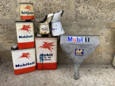A selection of Mobiloil oil cans, grease tin, oil measures etc.