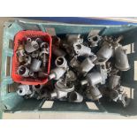 A box of assorted SU carburettors and parts.