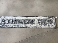 A street name sign for Holmbridge Gadns, 50 x 11".