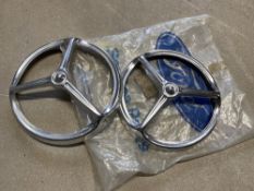 A pair of new old stock Ford three point headlamp covers, possibly early Cortina.