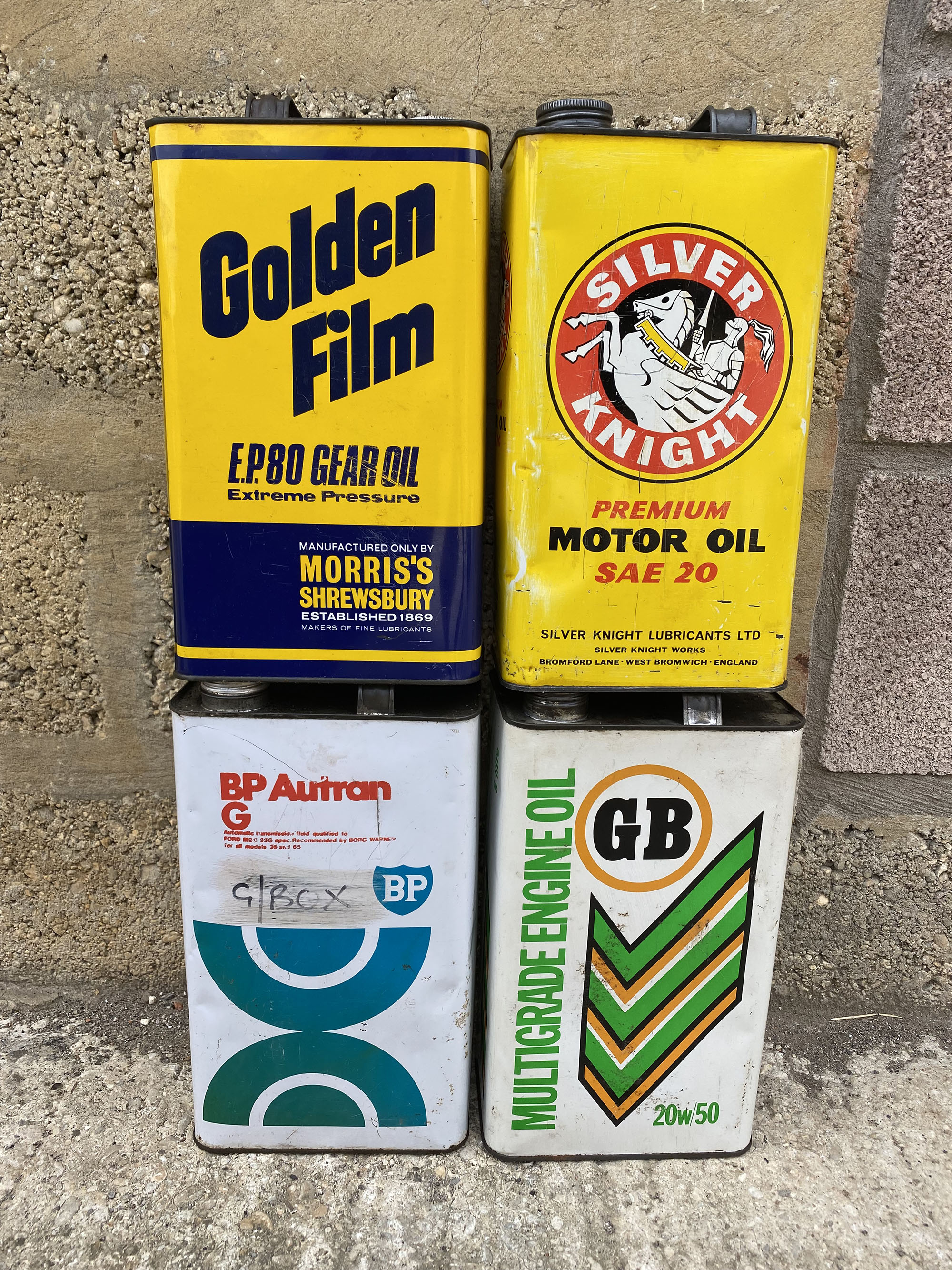 Four gallon cans including Morris's Shrewsbury Golden Film and Silver Knight.
