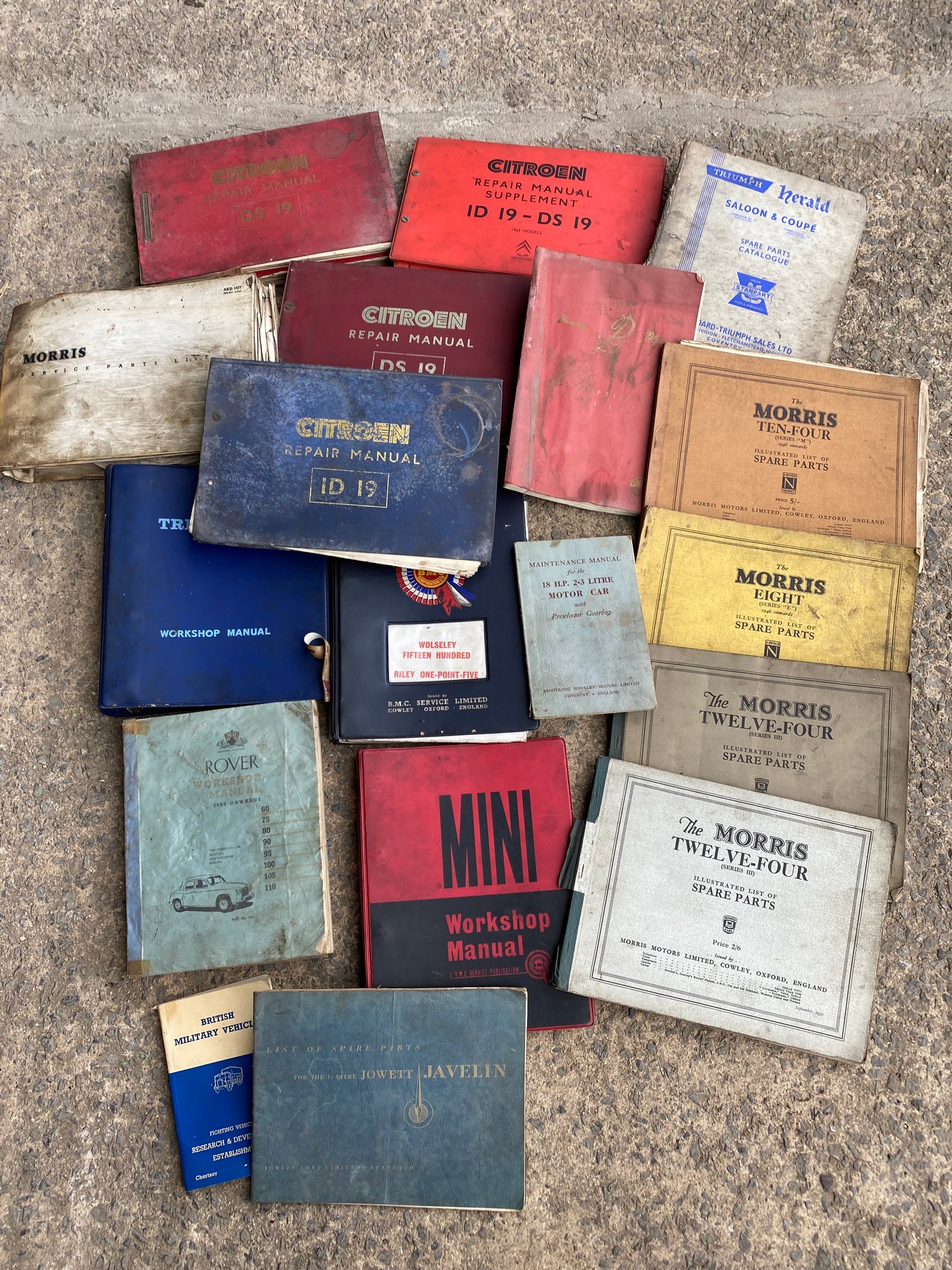 A quantity of workshop manuals, repair manuals, spare parts lists etc. including pre-war Morris.