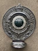 An RAC Associate car badge with Wellington Automobile Club enamel centre.