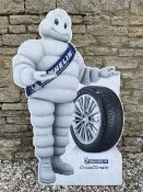 A Michelin plastic advertising sign in the form of Mr Bibendum, 38 x 59".