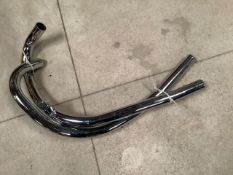 BSA new old stock 650cc Road Rocket exhaust downpipes.