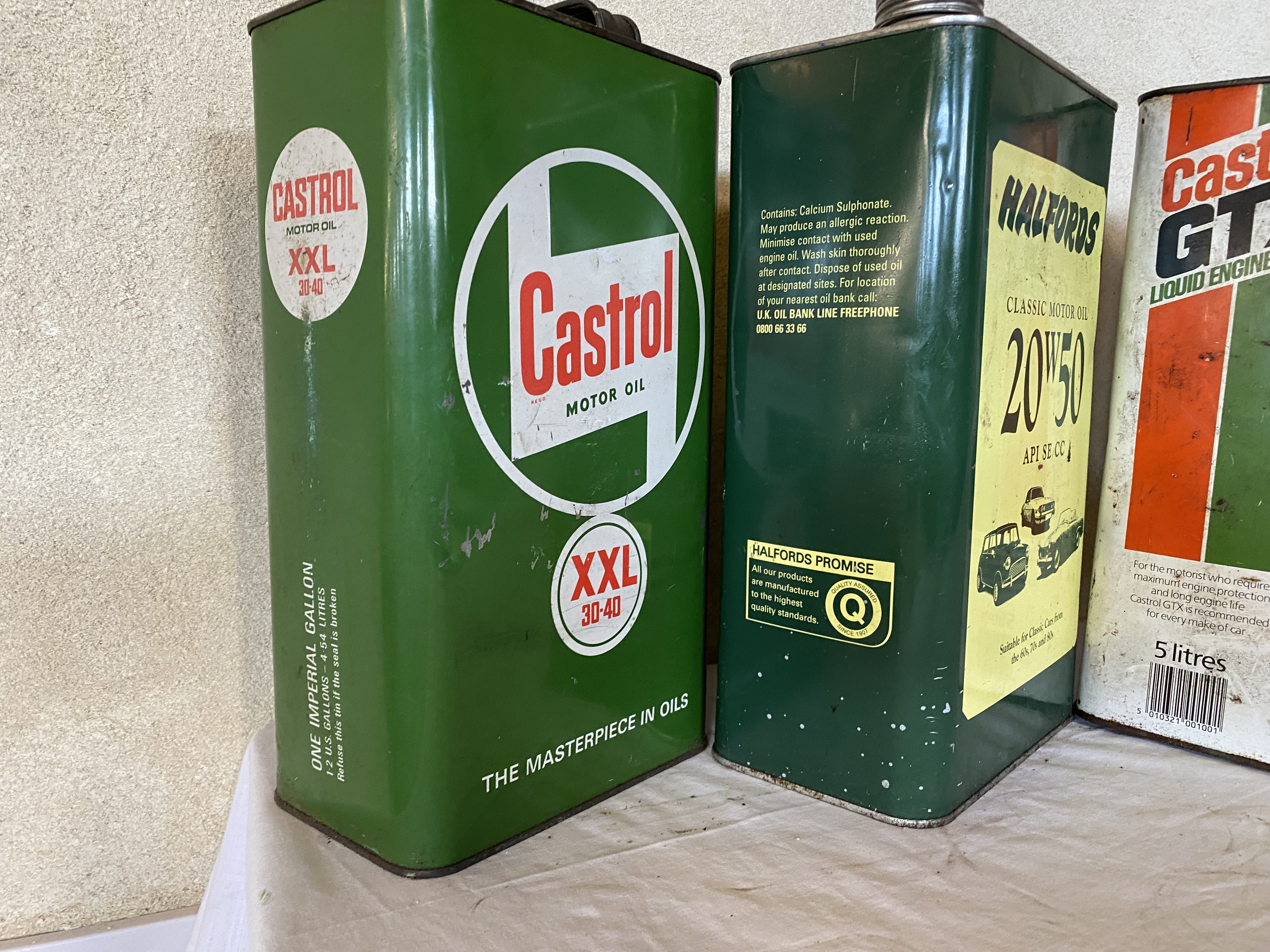 A Castrol Motor Oil XXL 30-40 grade gallon can, still with contents, a Castrol GTX gallon can. - Image 2 of 4