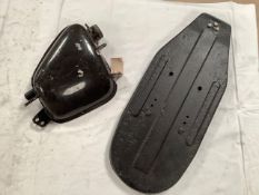 A Triumph oil tank and a metal BSA seat base, appear in good condition.