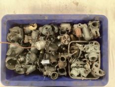 A quantity of various carburettors.