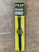 A Duckhams promotional wristwatch in original packaging.