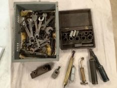A box of spanners including BSA, Triumph, Humber etc. cable swaging tool and grease guns.