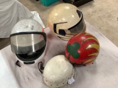 Four used motorcycle helmets including an Everoak Racemaster