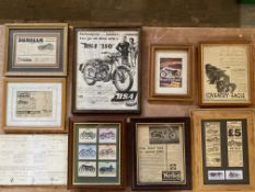 A selection of framed and glazed motorcycle magazine extract advertisements.