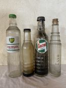 A BP Energol quart oil bottle, a Castrol quart oil bottle and two pint bottles.