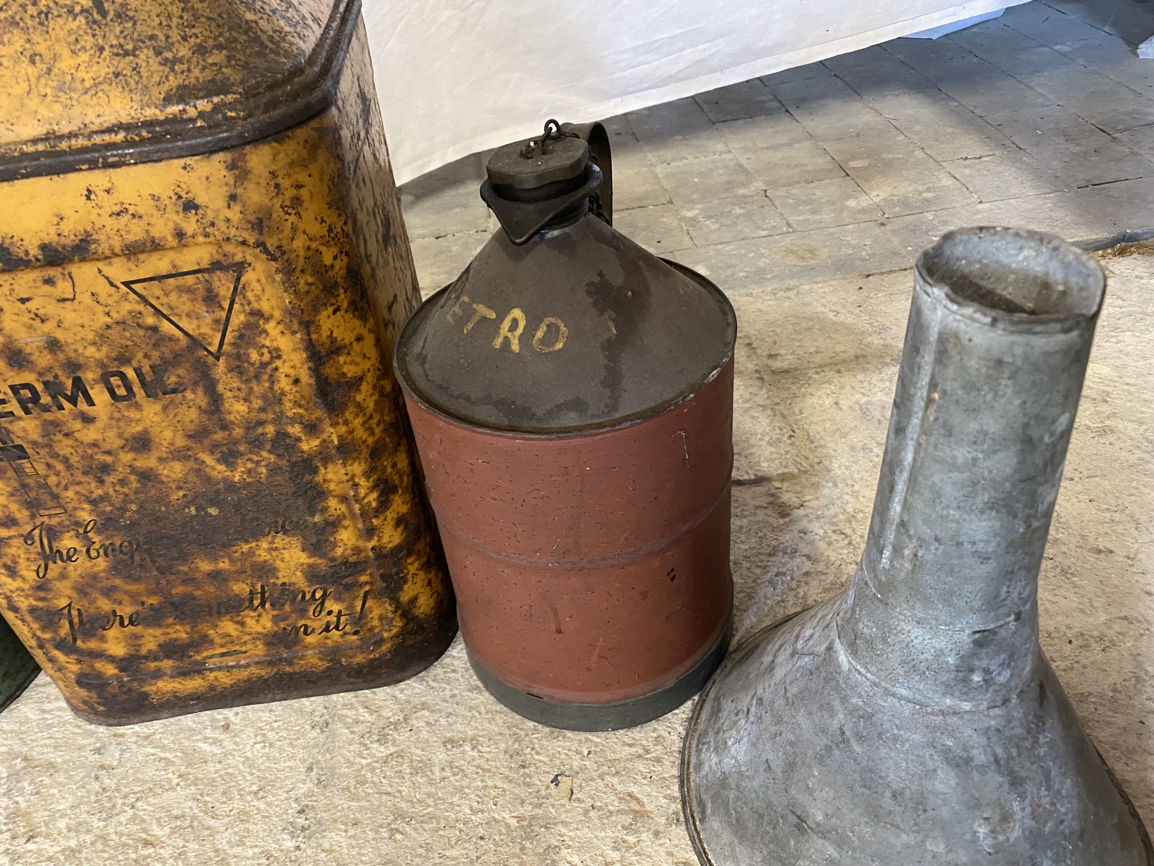 A Germ Oils five gallon pyramid can, two cans bearing labels for Gayflo Para-Feed, a petrol can. - Image 3 of 3