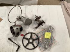 Various parts including a BSA Dandy headlamp shell and switches, an auto-cycle hub and brake.