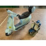 A Barbie plastic model of a Vespa scooter by Mattel plus a resin model of a Vespa.