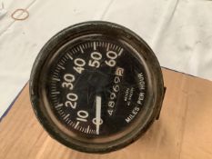 A 60mph speedometer, unknown manufacturer.
